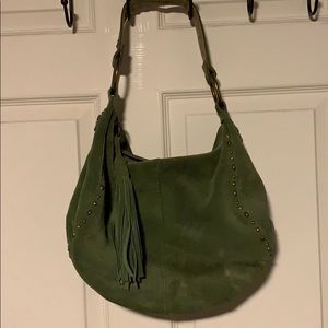Suede green lucky purse. Used